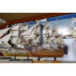 A model of the Royal Yacht Britannia and three other models of galleons