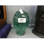 A large Victorian green glass dump paperweight