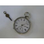 A Victorian silver pocket watch and key in very good condition, winds and ticks. Hallmarked Chester