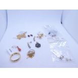 Mixed lot; 2 9ct chains, 9ct gold ball studs, 9ct gold wedding band, 3 gem set pendants and a pair o