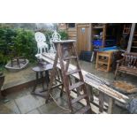Three vintage wooden step ladders, 2 very tall and one medium