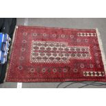 An Afghan prayer rug with geometric style design, 146 x 93 cms