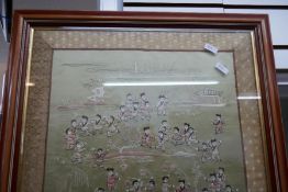 A Chinese silk panel of children in landscape