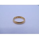 22ct yellow gold wedding band marked 22, with internal inscription, size K, approx 4.01g