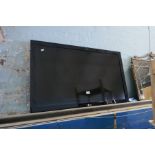 An LG Flatscreen TV with remote (no stand)