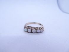 9ct yellow gold half hoop ring set with 5 circular cabouchon opals, marked 375, Birmingham, size P,