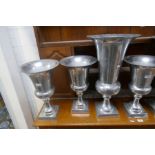 A quantity of polished aluminium urns (7)