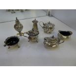 A quantity of silver salts and peppers, having various hallmarks, designs and patterns, Decorative d