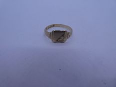 9ct yellow gold signet ring with square panel on stepped panel marked 375, size N 1.64g approx