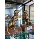 A pair of Art Deco bookends in form of seated spaniel