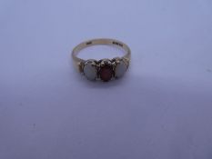 9ct yellow gold three stone opal and garnet ring, marked 375, size Q, approx 2.58g