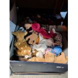 A box of Ty Beanie Babies and two boxes of other toys