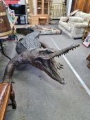 A bronze life size sculpture of Crocodile, approx 367cm long (or 16ft) in a standing pose. An impres