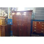 A Victorian Mahogany 2 door wardrobe on plinth base - dimensions are 206cm high, 116cm wide and 52cm