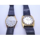 Two vintage gents wristwatches a Roamer Micro Quartz and a Mitchells Exeter example, both on black s