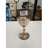 A silver Victorian goblet by Richards and Brown, having engraved decoration and beaded borders. With