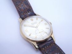 ROLEX; A vintage gents 9ct yellow gold cased Rolex Precision with champagne dial baton markers and n