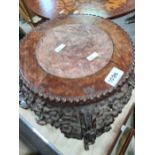 A carved oriental pot stand table with stone insert, on carved and pierced decoration base, with che