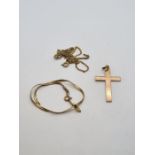 Small quantity 9ct gold to include 3 chains AF and a 9ct gold cross pendant, 4.15g approx