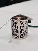An interesting novelty silver pin cushion basket having a silver thimble inside. The basket with pre