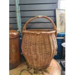 A large wicker log basket