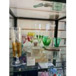 A quantity of drinking glasses including a German engraved example and two silver lidded items