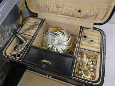 Jewellery box containing modern and vintage costume jewellery including earrings, brooches, and a tr