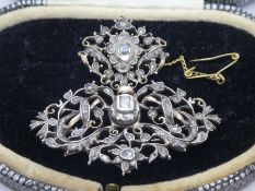 Georgian silver and gold floral pendant brooch set with diamonds, top open work panel with closed ba