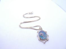 9ct yellow gold herringbone design neckchain hung with an opal set oval pendant with 9ct mount and f