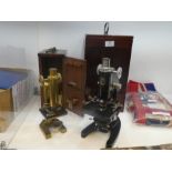 An antique brass microscope by R & J Beck, London No. 27884 in mahogany fitted case and one other la