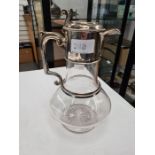 A Victorian silver mounted glass Claret jug, having silver beaded girdle and beaded borders. The co