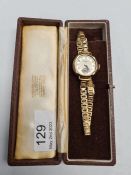 Shierwater & Lloyd; a vintage Schierwater & Lloyd gold cased wristwatch with silvered dial and subsi