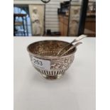 A very decorative Victorian silver sugar bowl having half reeded body with embossed foliate design a