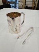 A silver tankard by Goldsmiths and Silversmith Co Ltd., London 1946, with writing engraved on the bo