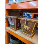 Two similar painted lidded boxes decorated birds and monkeys