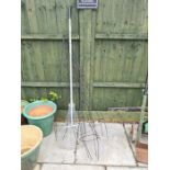 Folding garden rake and 4 spiral wire plant supports