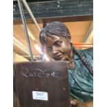 A modern bronze Walt Disney sculpture of lying girl reading book, signed to reverse, size 88cm, poss