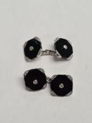 Pair of 18ct and Platinum cufflinks taperd with square onyx panel each corner set diamond and all mo