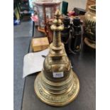 An old brass Burmese Stupa having engraved decoration, 35.5cm