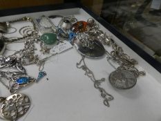 Tray of good quality silver jewellery to include brooches, pendants, earrings, silver ingot, locket,