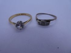 18ct yellow gold solitaire ring set with clear stone, marked 750 and Plat, together with another gol