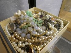 Tray of mixed costume jewellery to include bead necklaces, silver cased pocket watch, gold plated wr