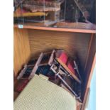 A selection of 60s/70s furniture including display cabinet, bookcase and Lloyd Loom Ottoman and a cl