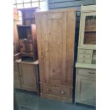 An old pine single door wardrobe and a modern pine chest having 2 short and 3 long drawers, 75cm x 1
