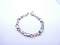 Mid-century opal and Mother of Pearl panel bracelet, comprising 3 white overtone opals and  3 altern