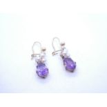 Pair of 9ct drop earrings each with 3 seed pearls above suspended pear shaped amethyst, marked 375