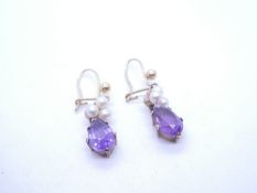 Pair of 9ct drop earrings each with 3 seed pearls above suspended pear shaped amethyst, marked 375