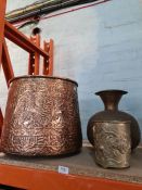 An oriental brass cylindrical pot decorated dragon, a large copper cauldron having Islamic design of