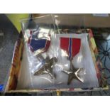 A U.S. Distinguished Service Medal and a Bronze Star
