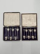 A cased set of decorative silver spoons having pretty pattern bowls and finials. Hallmarked London 1